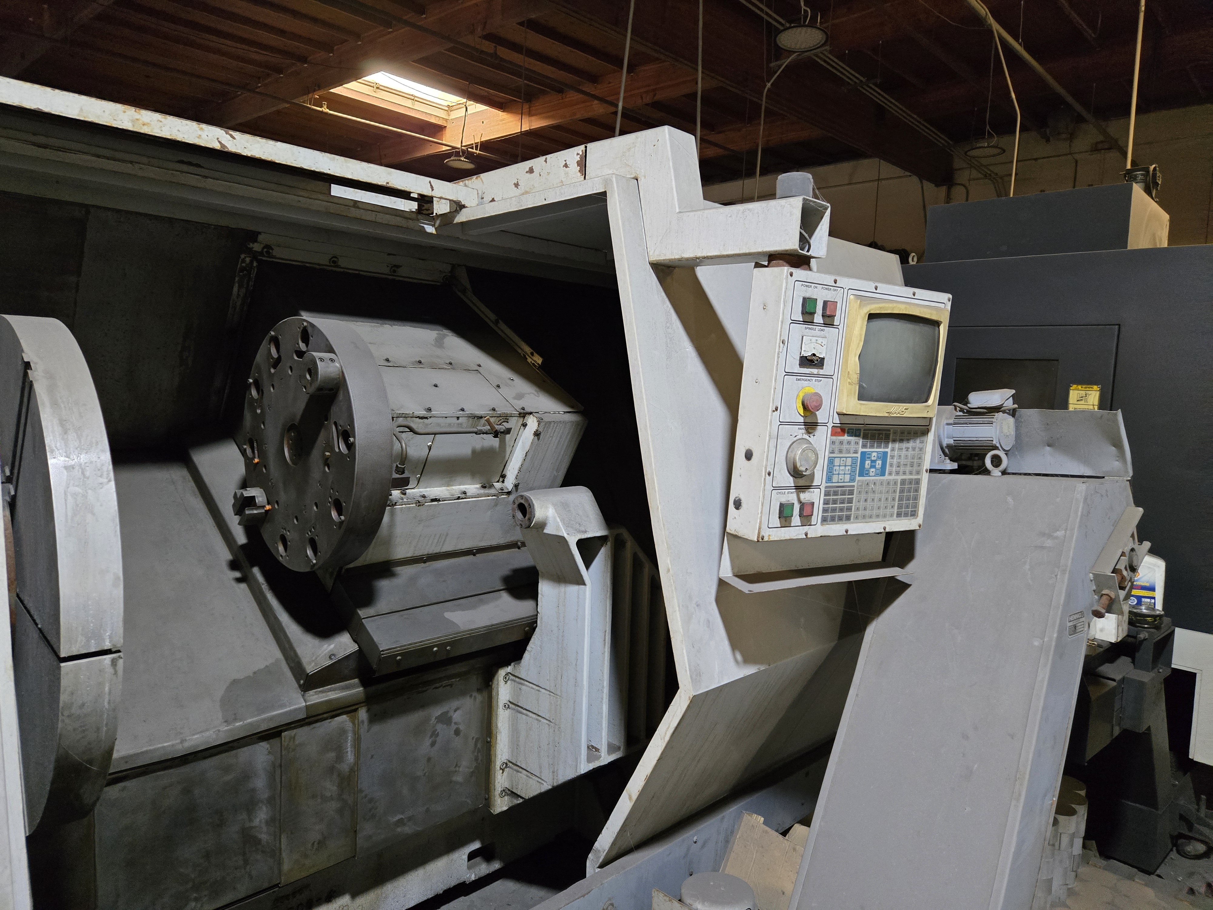 1998 Haas HL-6 CNC Lathe – turret and work area