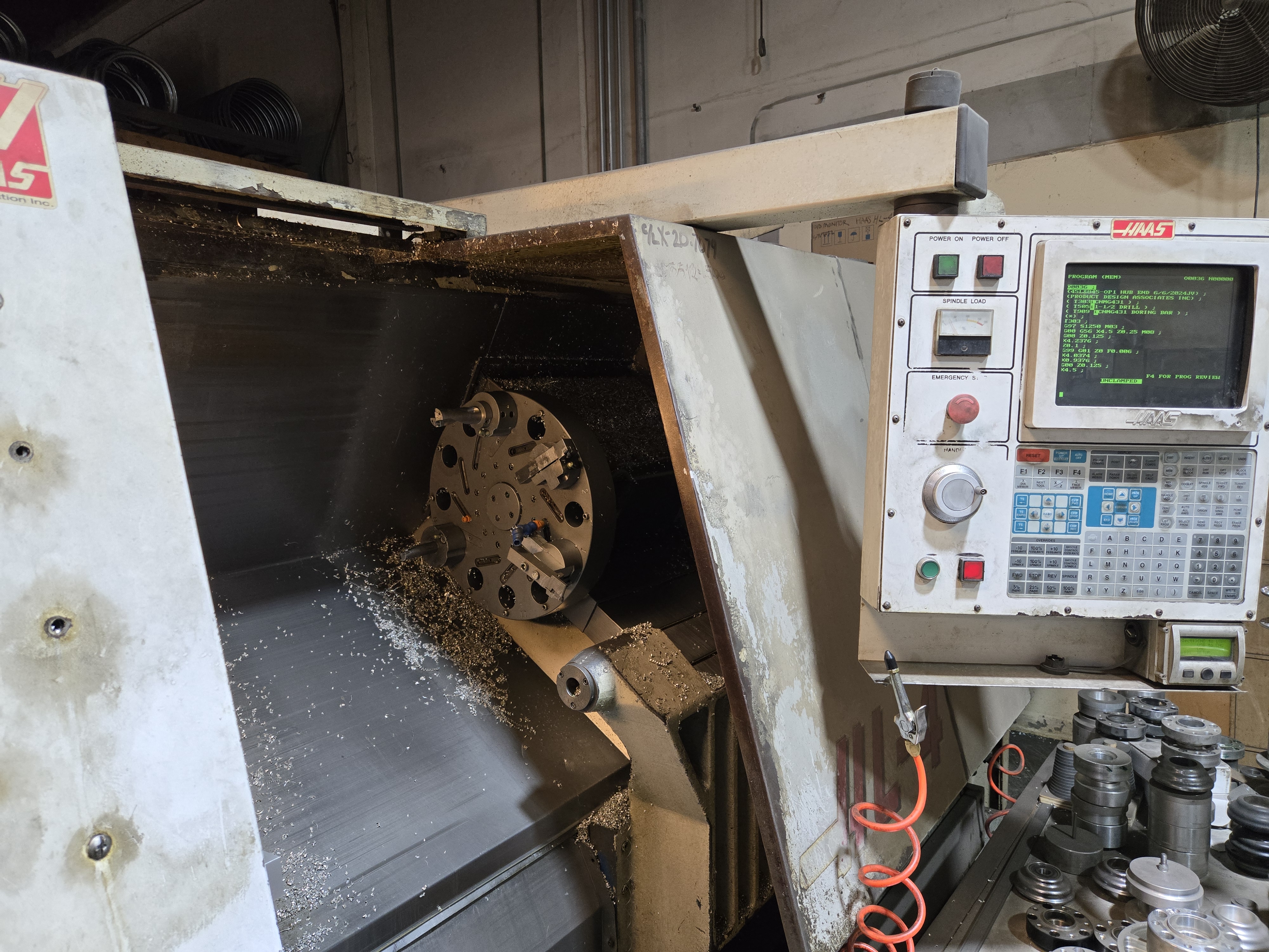 1997 Haas HL-4 CNC Lathe – turret and work area